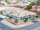 Charming single-story home featuring a large garage, landscaped yard, and a welcoming covered porch at 439 Cannes St, Henderson, NV 89015