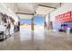 Large, well-equipped garage with multiple bays and workspace, perfect for projects at 439 Cannes St, Henderson, NV 89015