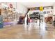 The expansive garage boasts car lift, storage, and display cabinets at 439 Cannes St, Henderson, NV 89015