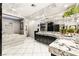 The main bathroom has dual vanities, a soaking tub, and sleek black cabinets at 439 Cannes St, Henderson, NV 89015
