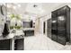 This main bathroom features dual vanities, storage cabinets and drawers, and lots of lighting at 439 Cannes St, Henderson, NV 89015