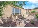 View of backyard with neutral exterior paint, hardscape and desert landscaping at 45 Via Di Mello, Henderson, NV 89011