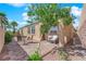 Backyard patio featuring stone pavers, desert landscaping and outdoor seating in a quiet area at 45 Via Di Mello, Henderson, NV 89011