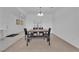 Simple dining area complemented by contemporary accents, near the front door at 45 Via Di Mello, Henderson, NV 89011