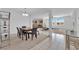 Bright, open-concept dining area with view of the living room and kitchen at 45 Via Di Mello, Henderson, NV 89011