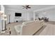 Open-concept living room with a kitchen view, perfect for entertaining at 45 Via Di Mello, Henderson, NV 89011