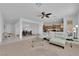 Spacious living room with tile flooring, open layout, and abundant natural light at 45 Via Di Mello, Henderson, NV 89011