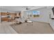 Open living room featuring a spacious layout and stylish white furniture at 45 Via Di Mello, Henderson, NV 89011