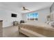 Cozy main bedroom boasts natural light, neutral tones and a calming atmosphere at 45 Via Di Mello, Henderson, NV 89011
