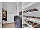 Spacious walk-in closet with ample shelving and hanging space, providing organized storage at 45 Via Di Mello, Henderson, NV 89011