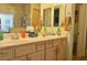 Bathroom with double sinks, lots of counter space and cabinets for storing toiletries at 4770 Lorenzo Way, Pahrump, NV 89061