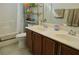 Bathroom featuring a double sink vanity with modern fixtures and a shower/tub combo at 4770 Lorenzo Way, Pahrump, NV 89061