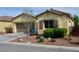Charming single-story home with well-maintained landscaping and attached garage at 4770 Lorenzo Way, Pahrump, NV 89061