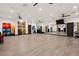Spacious gym with ceiling fans, a mirrored wall, and various workout stations at 4770 Lorenzo Way, Pahrump, NV 89061