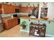 Traditional kitchen with granite countertops, stainless steel appliances and charming decorative accents at 4770 Lorenzo Way, Pahrump, NV 89061