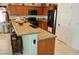 The kitchen showcases granite countertops, black appliances, and ample cabinet space at 4770 Lorenzo Way, Pahrump, NV 89061