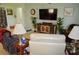 Inviting living room with comfortable seating and stylish decor in a naturally lit space at 4770 Lorenzo Way, Pahrump, NV 89061
