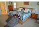 Main bedroom features a bed with storage and pet stairs to help your furry friend get up at 4770 Lorenzo Way, Pahrump, NV 89061