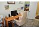 Bright home office featuring a desk, computer, and comfortable chair at 4770 Lorenzo Way, Pahrump, NV 89061