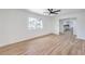 Spacious living room featuring modern flooring, ample natural light, and an open layout at 4957 E Harmon Ave, Las Vegas, NV 89121