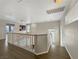 Bright upstairs hallway featuring wood floors, neutral walls, and white trim at 504 Landra Ln, Henderson, NV 89015