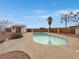 Inviting backyard pool with lush landscaping and a storage shed, creating a private oasis at 504 Landra Ln, Henderson, NV 89015