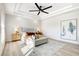 An airy primary bedroom with a modern fan and a decorative area rug at 5737 Heather Breeze Ct, Las Vegas, NV 89141