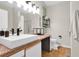 Modern bathroom featuring a vessel sink and a walk-in shower at 5751 E Hacienda Ave # 119, Las Vegas, NV 89122