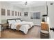 Bedroom with a plush bed, soft lighting, and cozy decor, offering a relaxing retreat at 5751 E Hacienda Ave # 119, Las Vegas, NV 89122