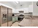 Kitchen featuring stainless steel appliances, white cabinets and granite countertops at 5751 E Hacienda Ave # 119, Las Vegas, NV 89122