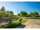 Beautifully maintained community green space with walking paths and lush landscaping at 580 Via Di Parione Ct, Henderson, NV 89011