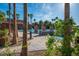A luxurious community pool is surrounded by mature landscaping, offering a relaxing oasis at 580 Via Di Parione Ct, Henderson, NV 89011