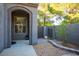 Private courtyard features manicured landscaping, a decorative rock garden, and gated access to the home's entrance at 580 Via Di Parione Ct, Henderson, NV 89011