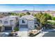 Beautiful two-story home with a neutral color palette, well-maintained landscaping, and a mountain view at 580 Via Di Parione Ct, Henderson, NV 89011