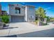 Beautiful two-story home featuring a spacious driveway, two-car garage, and manicured landscaping at 580 Via Di Parione Ct, Henderson, NV 89011