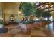 Stunning lobby with soaring ceilings, lush greenery, and elegant decor, creating a welcoming atmosphere at 580 Via Di Parione Ct, Henderson, NV 89011