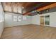 Expansive bonus room featuring wood paneled ceiling and doors to the exterior at 613 Kings Pl, Boulder City, NV 89005