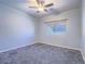 Bedroom with neutral carpet, window with view, offering comfortable and private living at 6709 Barrington Hills St, Las Vegas, NV 89149
