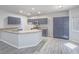 Eat-in kitchen features granite countertops and stainless steel appliances at 6709 Barrington Hills St, Las Vegas, NV 89149