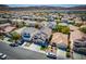 Aerial view of a residential neighborhood with well-maintained homes and landscaping at 6973 Pacific Coast St, Las Vegas, NV 89148