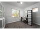 Bright, carpeted home office with built in storage, blinds, and natural light at 6973 Pacific Coast St, Las Vegas, NV 89148