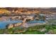 Picturesque aerial shot featuring a lakefront community surrounded by mountains and green spaces at 7 Hilltop Crest St, Henderson, NV 89011