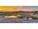 Breathtaking aerial view showcases the Lake Las Vegas entrance, scenic landscape, and distant mountain range at 7 Hilltop Crest St, Henderson, NV 89011