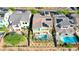 Aerial view of backyards with pools and outdoor seating areas at 7 Hilltop Crest St, Henderson, NV 89011
