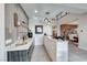 Extended bar area complete with ample counter space and stylishly displayed glassware and accessories at 7 Hilltop Crest St, Henderson, NV 89011