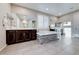 Luxurious bathroom with a large soaking tub, dual vanities, and modern tile flooring at 7 Hilltop Crest St, Henderson, NV 89011