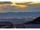 Striking view of the Las Vegas skyline and mountains at sunset at 7 Hilltop Crest St, Henderson, NV 89011