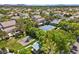 A view of the community featuring a tennis court, playground, and green space in a residential neighborhood at 7460 Grassy Field Ct, Las Vegas, NV 89131