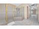 Spacious bathroom featuring a tile shower with glass doors and dual shower heads at 7460 Grassy Field Ct, Las Vegas, NV 89131