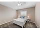 Bedroom with neutral walls, carpet and a full bed and side tables at 7460 Grassy Field Ct, Las Vegas, NV 89131